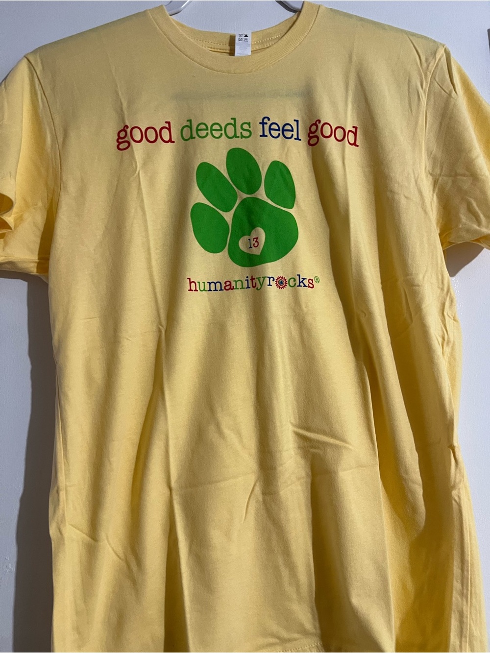Medium size Yellow Dog Paw T‑Shirt - Good Deeds Feel Good